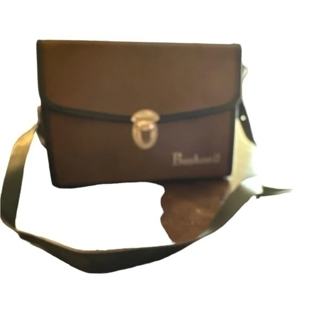 This listing is for a pair of Bushnell Insta Focus 7x35 binoculars with case.